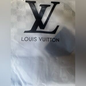 Louis Vuitton Textured Gray with Gold Tag